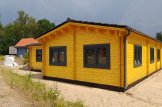 Casa de madera BERTA (44+44 mm), 72 m² + 18 m² porche y garaje 20 m² customer 2