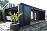 Casa de madera con porche ANNA Modern (Aislada, 34 mm + revestimiento), 20 m² + 16 m² porche customer 1