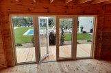 Oficina prefabricada de madera PREMIUM (Aislada PLUS, 34 mm + revestimiento), 7x4 m, 28 m² customer 3